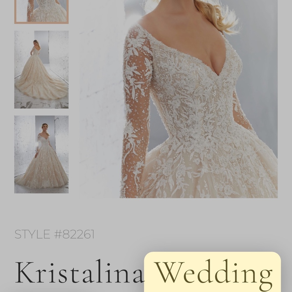 Beautiful kristalina wedding dress with long sleeves and a full skirt.